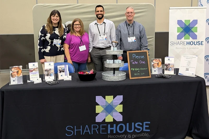 ShareHouse Team at ND Conference promotional booth.