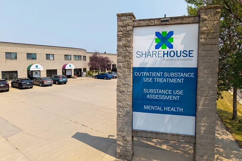 ShareHouse Outpatient exterior sign in front of the outpatient services building